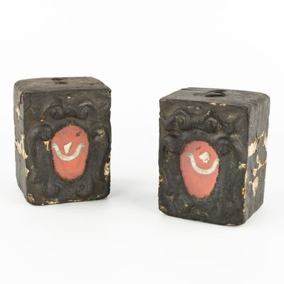 two pieces of soap with a smiley face on them