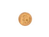 une image représentant une pièce d'or sur laquelle figure le portrait d'une femme