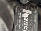 black leather jacket with a tag on the back of it