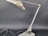 an image of a desk lamp with a cord attached to it