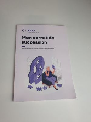a book on a table that has a picture of a woman sitting on a puzzle piece