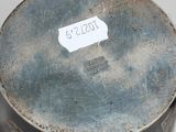 a metal container that has a label on it