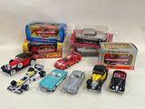 a lot of toy cars that are sitting on a table