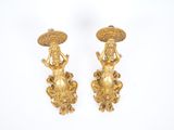 pair of antique gold plated figurines of a woman with umbrellas