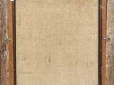 an old picture frame with a piece of burlock paper in it