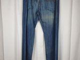 an image of a pair of jeans hanging on a hanger