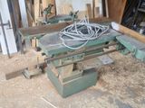 a picture of a workbench in a workshop with a lot of tools