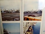four pictures of airplanes on display on the wall