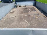 a truck that is parked on the side of the road