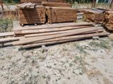 many pieces of wood stacked on top of each other
