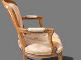 an image of a wooden chair with a beige upholstered seat