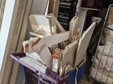 a cart full of boxes and boxes in a room