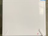 a picture of a white board with a blue tape on it