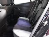 the back seats of a car with a seat belt in the back