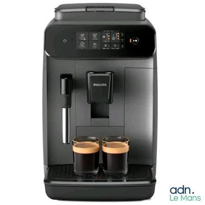 gros plan d'une machine à café avec deux tasses de café