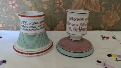 two cups that are sitting on a table