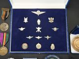 many medals and medals displayed in a display case