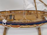 a model of a boat on display on a table