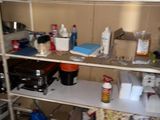 a shelf that has many items on it in the room