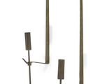 two candles that are hanging on the wall