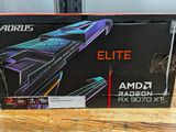 a box of amd radeon radeon elite gaming card on a wooden table