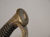 an image of a close up of a sword handle