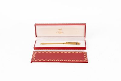 l'image d'un stylo dans un cadre rouge sur un fond blanc