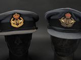 two hats with a crown and a crown on them on a mannequin head