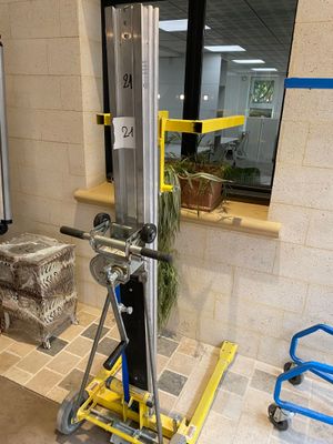 a machine that is sitting on a cart in a room