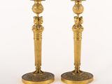 pair of antique brass candlesticks with lion heads