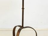 an image of a small table with a metal base and a circular top