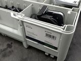 a white box with a bunch of electronics inside of it