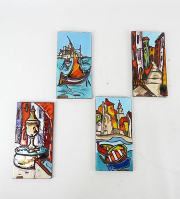 four small paintings of boats and buildings on a white surface