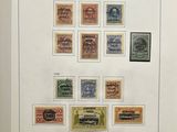 an open book with a bunch of different stamps on it