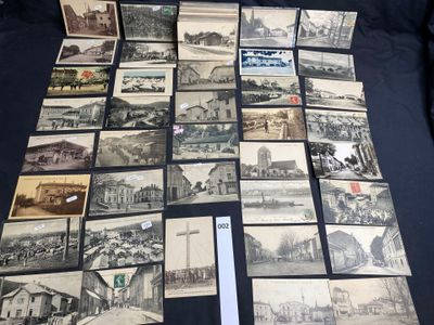 a lot of old postcards that are on the table