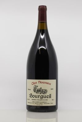 a bottle of wine that is sitting on a table
