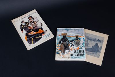 two cards that are sitting on a table