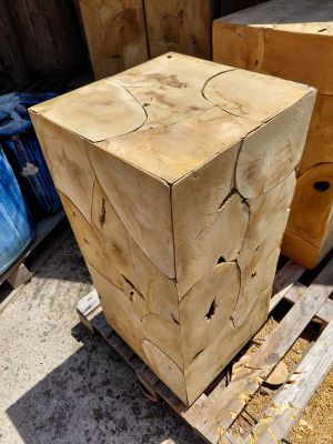 several pieces of wood stacked on top of a pallet in a yard