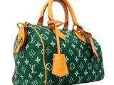 a green and white louis vuitton speedy bag on a white background