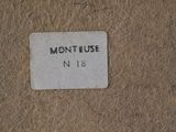 a picture of a sign on a wall that says monteuse