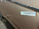 a sticker on the door handle of a car
