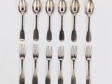 a set of six silver plated forks and spoons