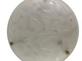 an image of a glass ceiling light with a pattern on it