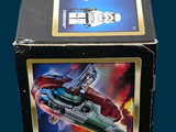 a box with a picture of a space ship inside of it