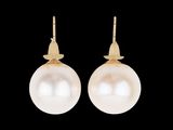 a pair of pearl and gold earrings