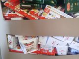 a cardboard box full of food sitting on top of a pallet