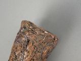 a close up of a metal object on a table