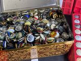 a lot of beer bottles in a box on a table