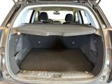 the back of a car with its trunk open showing the cargo area