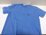 blue t - shirt with a black button on the chest